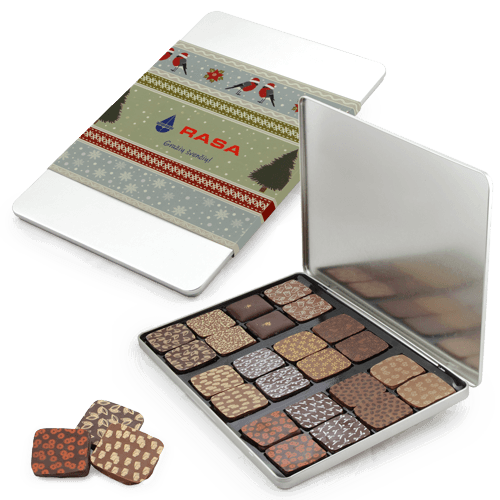A large gourmet decorated chocolate set in a metal box with advertising 
sleeve. Impressive Christmas business gift for those looking for elegance and harmony of sophisticated flavors.