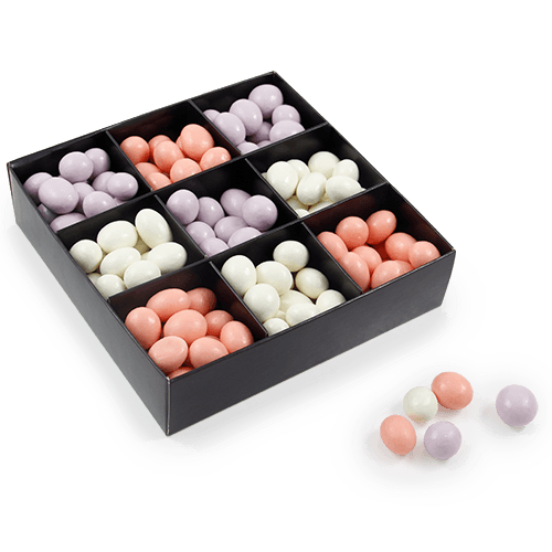 Easter is inseparable from spring color palette. Black-colored box with 
logo - colorful dragee set: various nuts and berries in chocolate. Playful sweet Easter gift for employees and business clients. Choose a range of extraordinary colors and flavors! Looking for exceptional, specific shades? We will create one that resembles the color of your brand in the brightest way.
