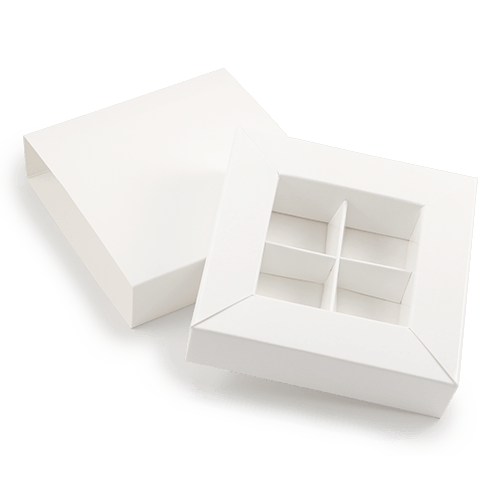 White gift box from laminated cardboard. Decorated with ribbon. The box 
is suitable for packaging four candies, various sweets and souvenirs. Custom (from 50 pcs.) We will produce boxes in other colors, put the logo, produce a ribbon with the print.