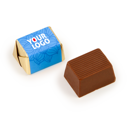 Naujos formos ir originalaus skonio šokoladinis saldainis papuošė mūsų 
reklaminių saldainių kolekciją. Saldainis su lazdyno riešutu įvilktas į foliją ir popierinę etiketę su logotipu.