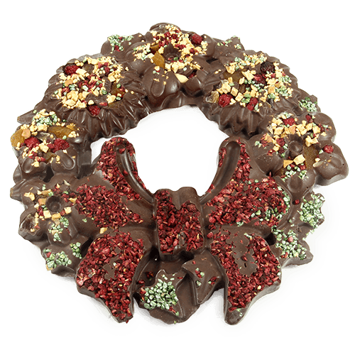 Puošnus gryno šokolado kalėdinis vainikas puoštas vaisiais ir uogomis.
Figūrinis šokoladas dėžutėje su logotipu ant viršelio - įspūdinga 
verslo dovana.