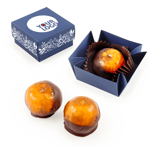 Ypatingas mandarinas reklaminėje dėžutėje. Sulčių sirupe mirkytas 
vaisius su žievele, apglaistytas juoduoju šokoladu.